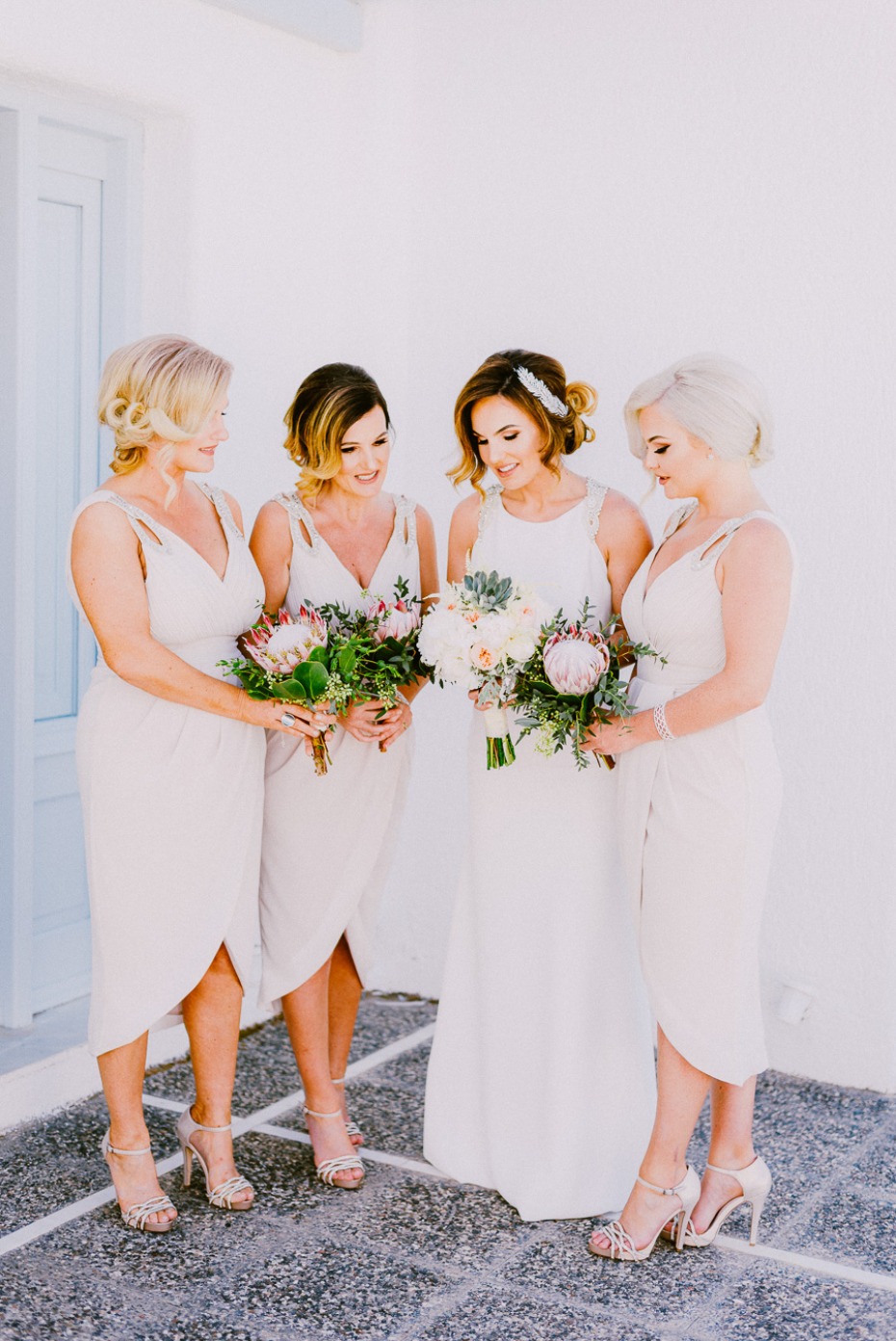 bride and her bridesmaids in white