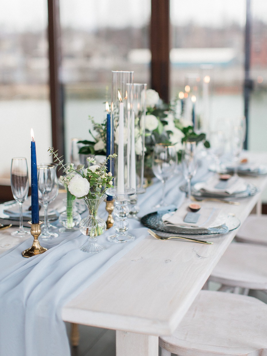 soft blue and white table decor with gold accents