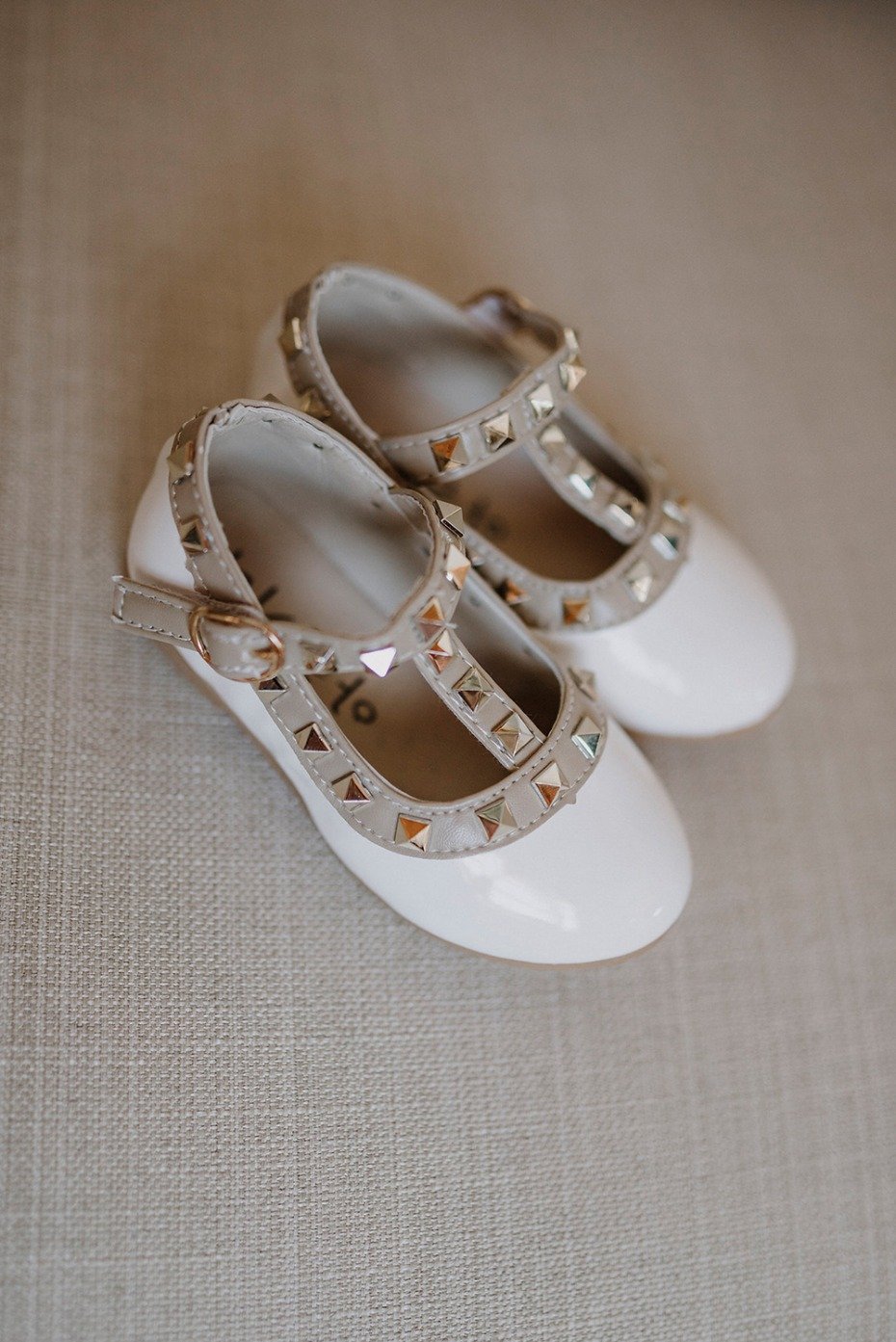mini studded wedding shoes for the daughter of the bride