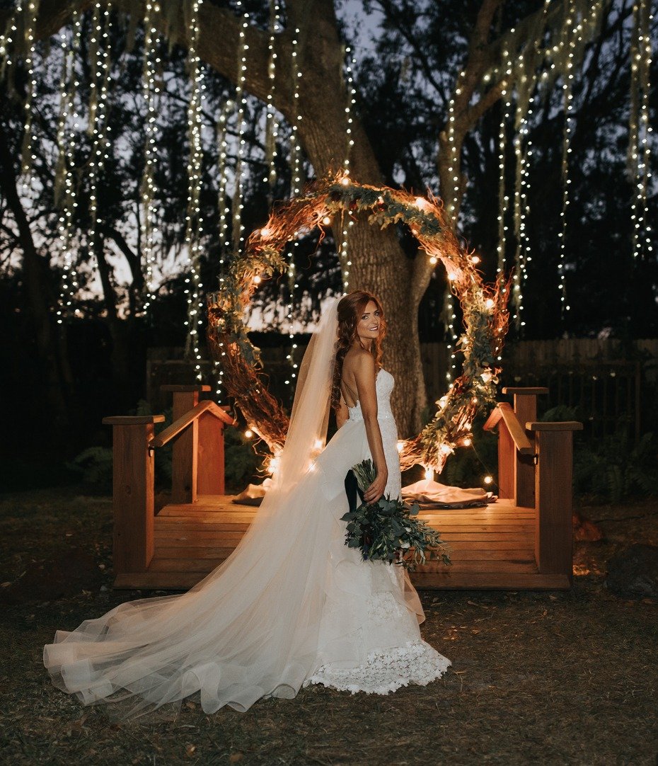 glowing giant wreath wedding backdrop