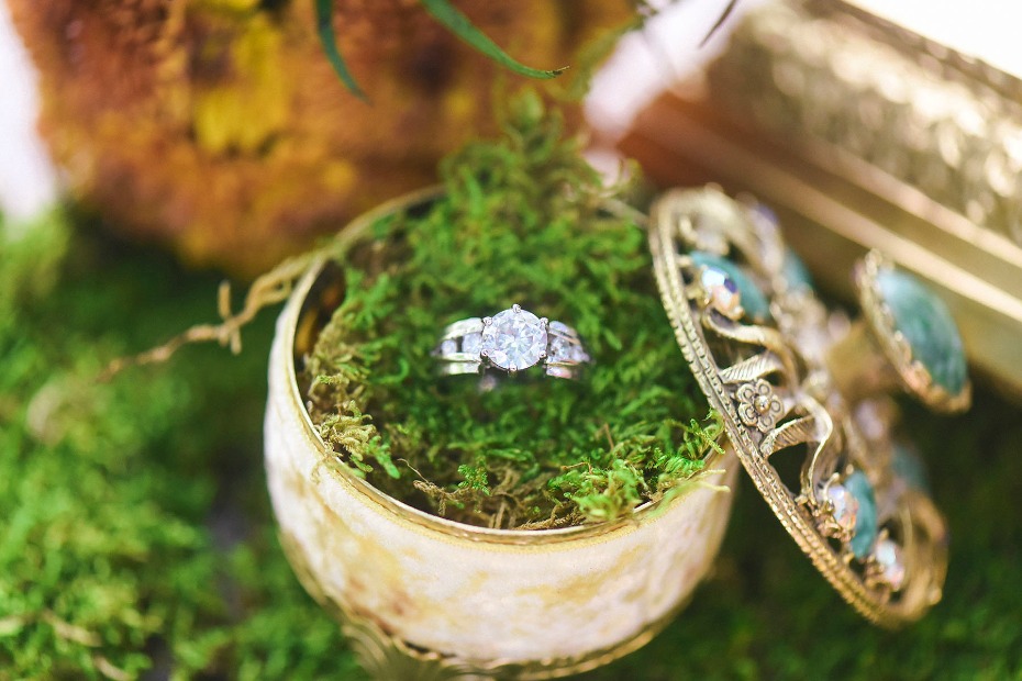 wedding ring in moss filled wedding ring box