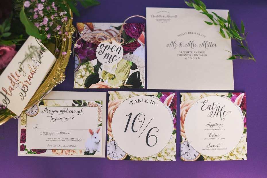 floral Alice in Wonderland themed wedding stationery