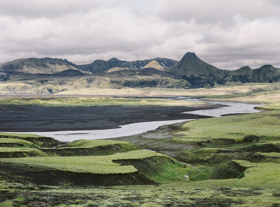 Serene Icelandic landscape with river and mountains