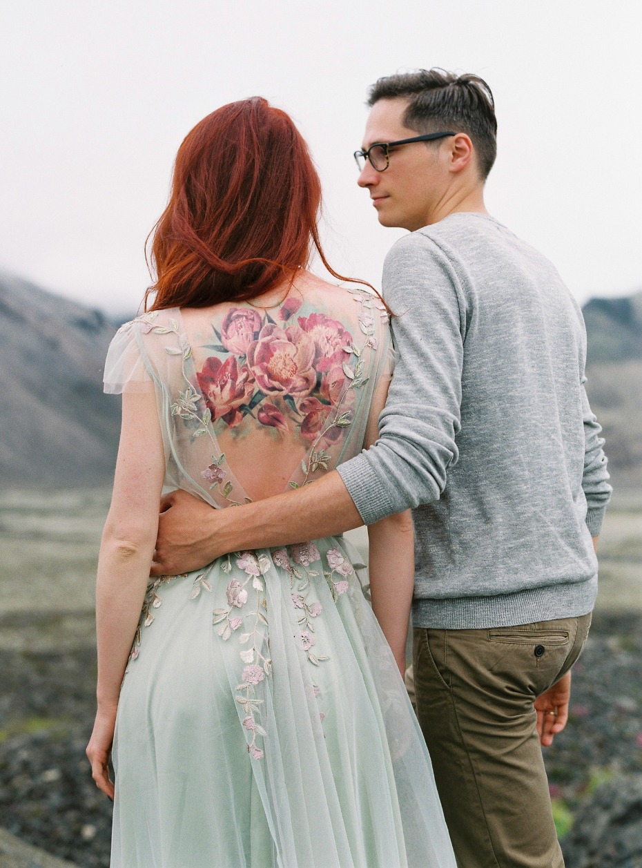 wedding dress that perfectly frames the bride to be's floral tattoo