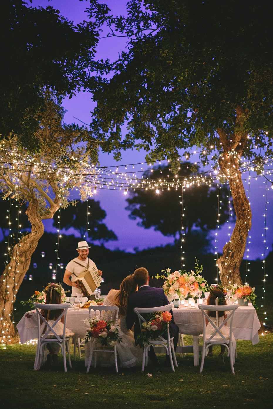 Whimsical garden wedding with twinkle lights