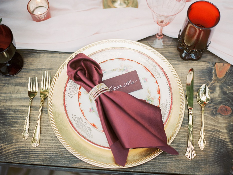 Burgundy and gold place setting