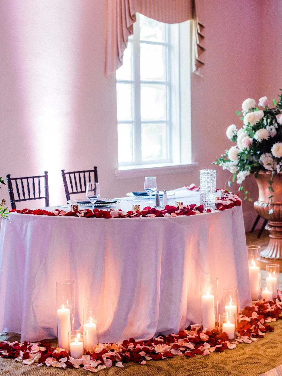 Cover your sweetheart table in rose petals