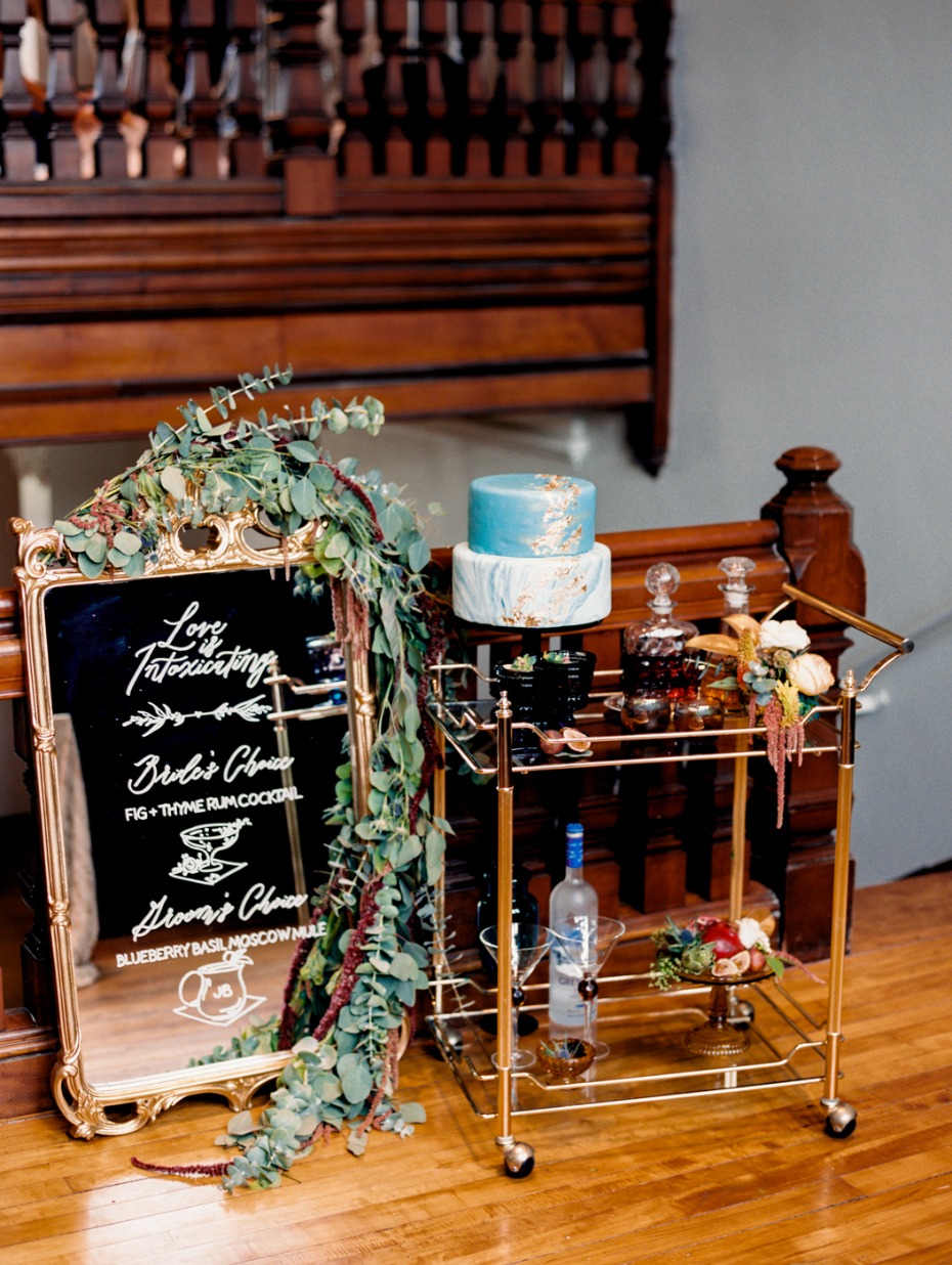 mirror wedding sign and self serve bar and cake table