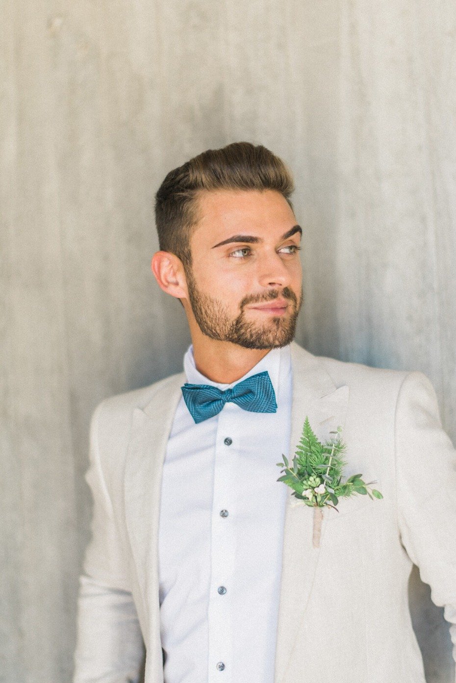 modern groom style in cream and blue