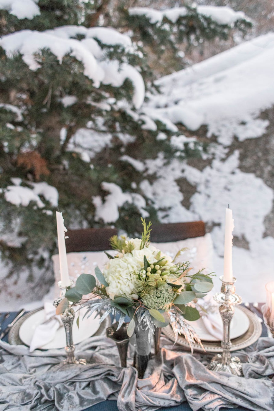 winter wedding table centerpiece with silver runner