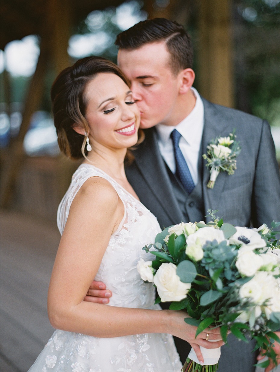 bride and groom wedding kiss