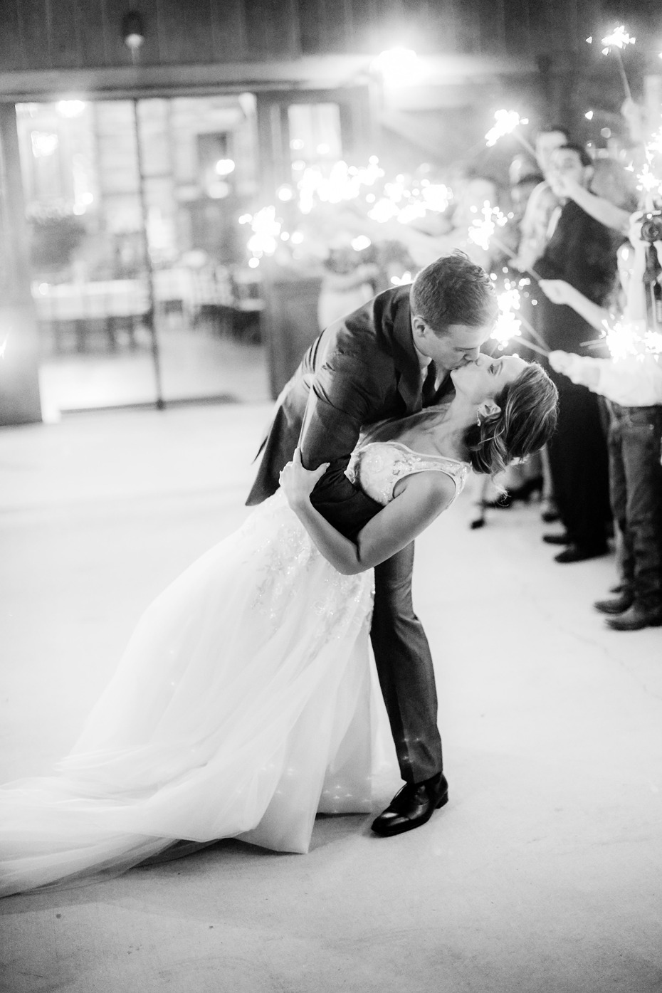 wedding dip kiss at sparkler exit