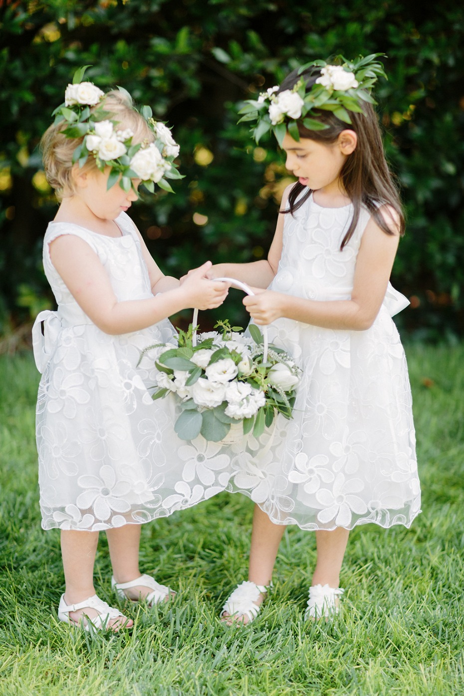 flower girls in white with flower halos