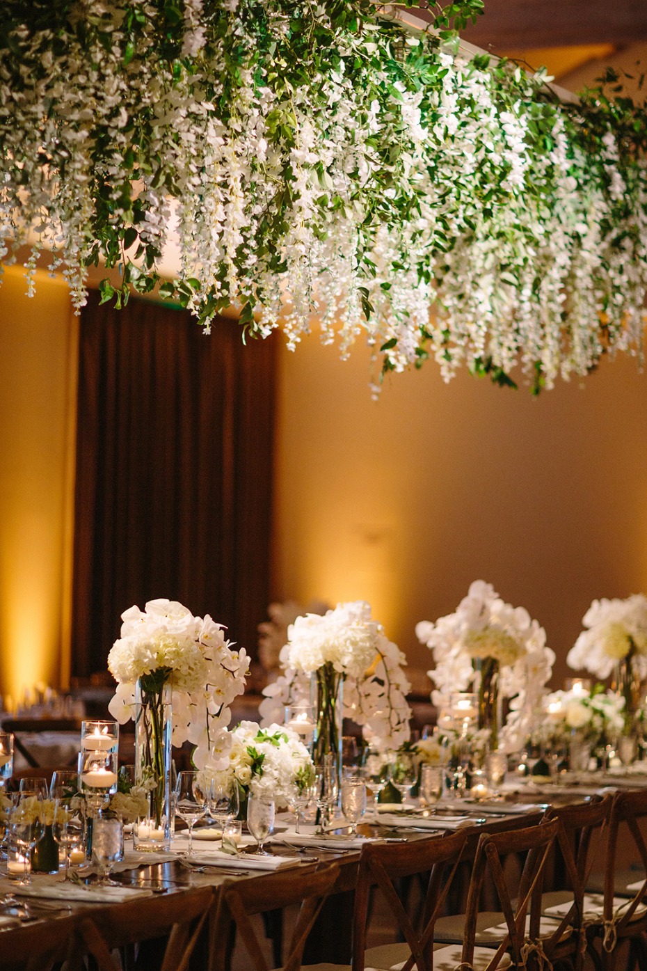 floral chandelier above the wedding party table