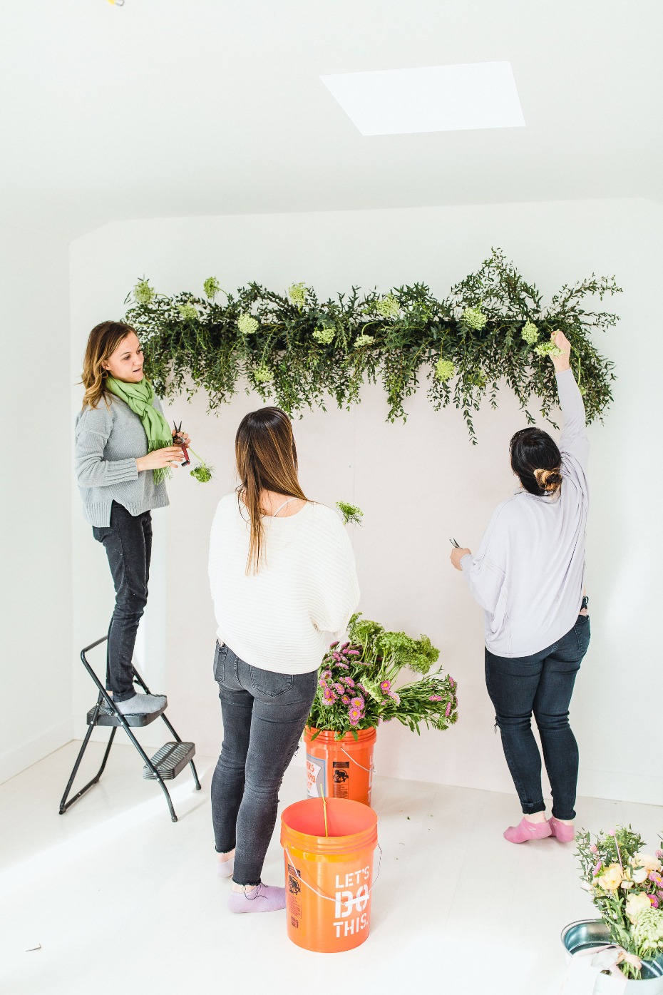 how to make a flower backdrop wall