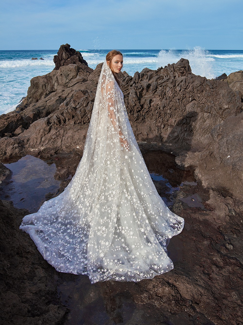 Starry wedding dress by the sea