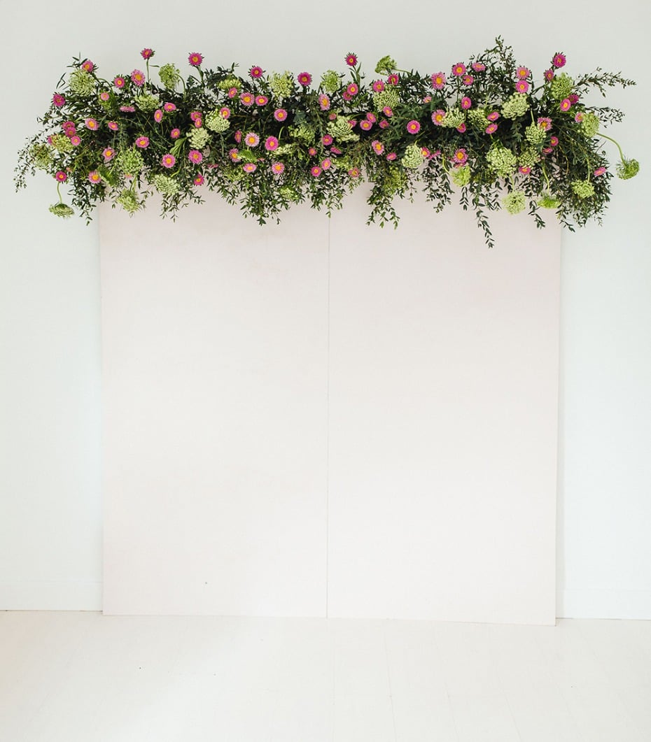 How to make a flower backdrop wall