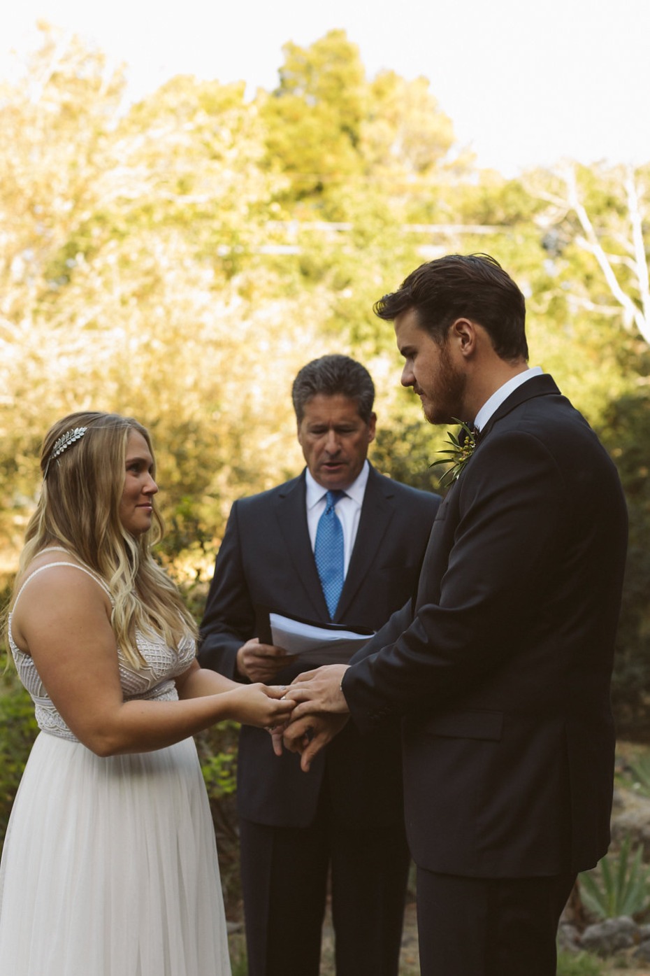 bride and groom exchanging vows