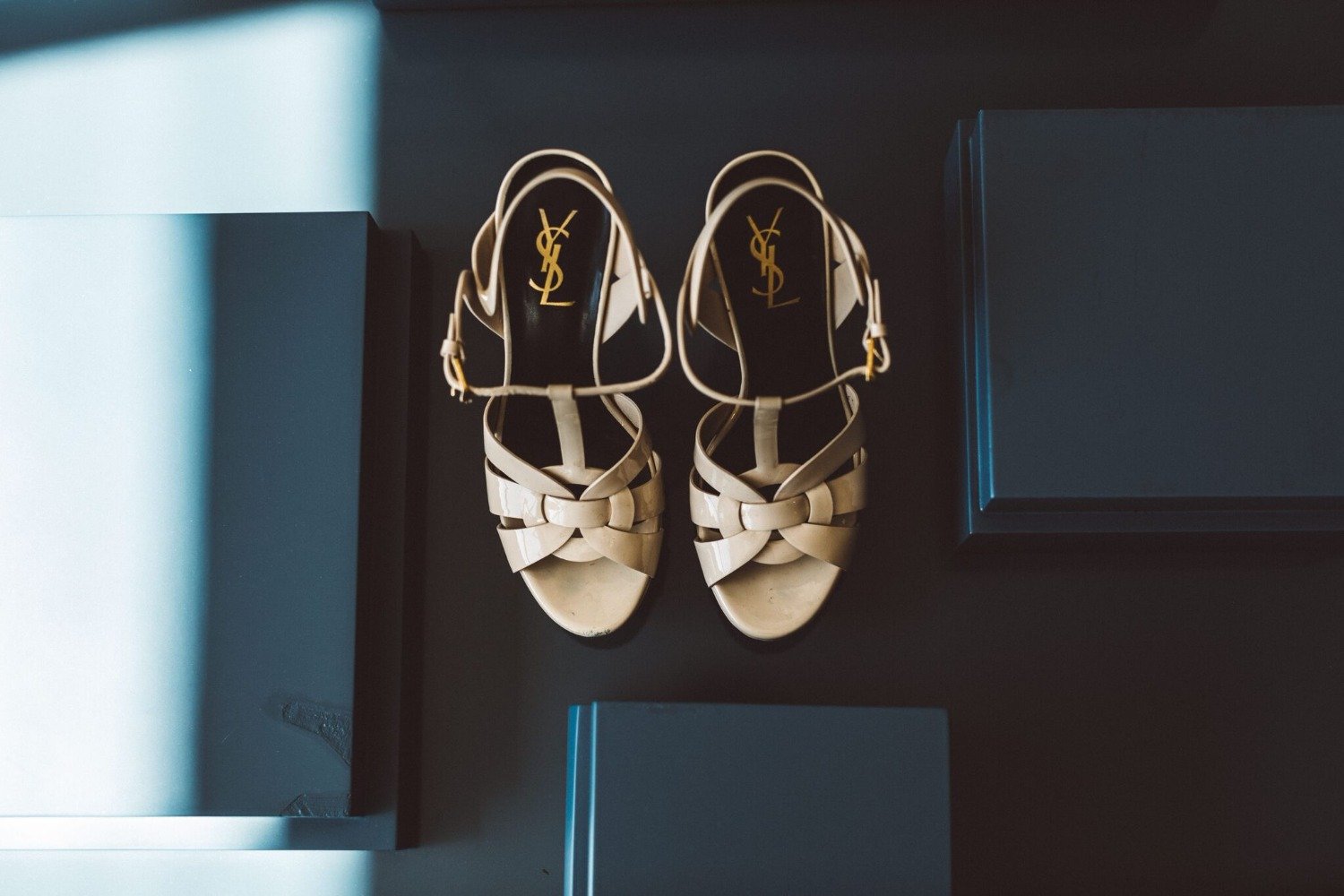 Saint Laurent's beige patent leather Tribute sandals
