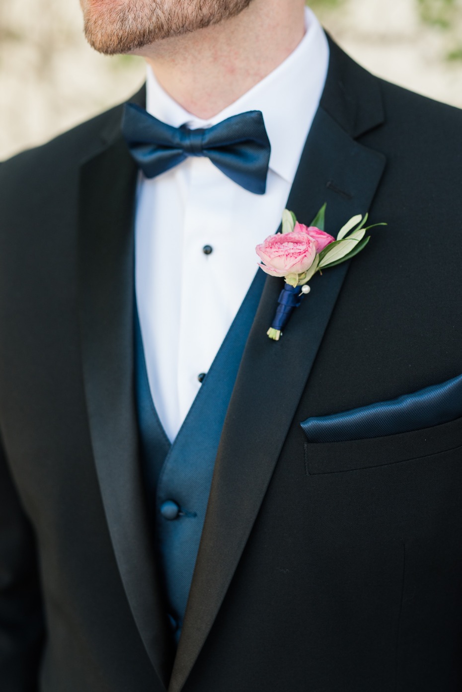 groom in black and navy