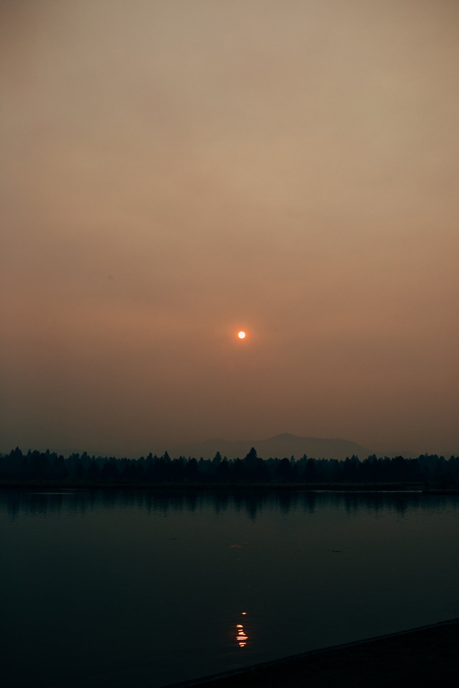 setting smoky sun
