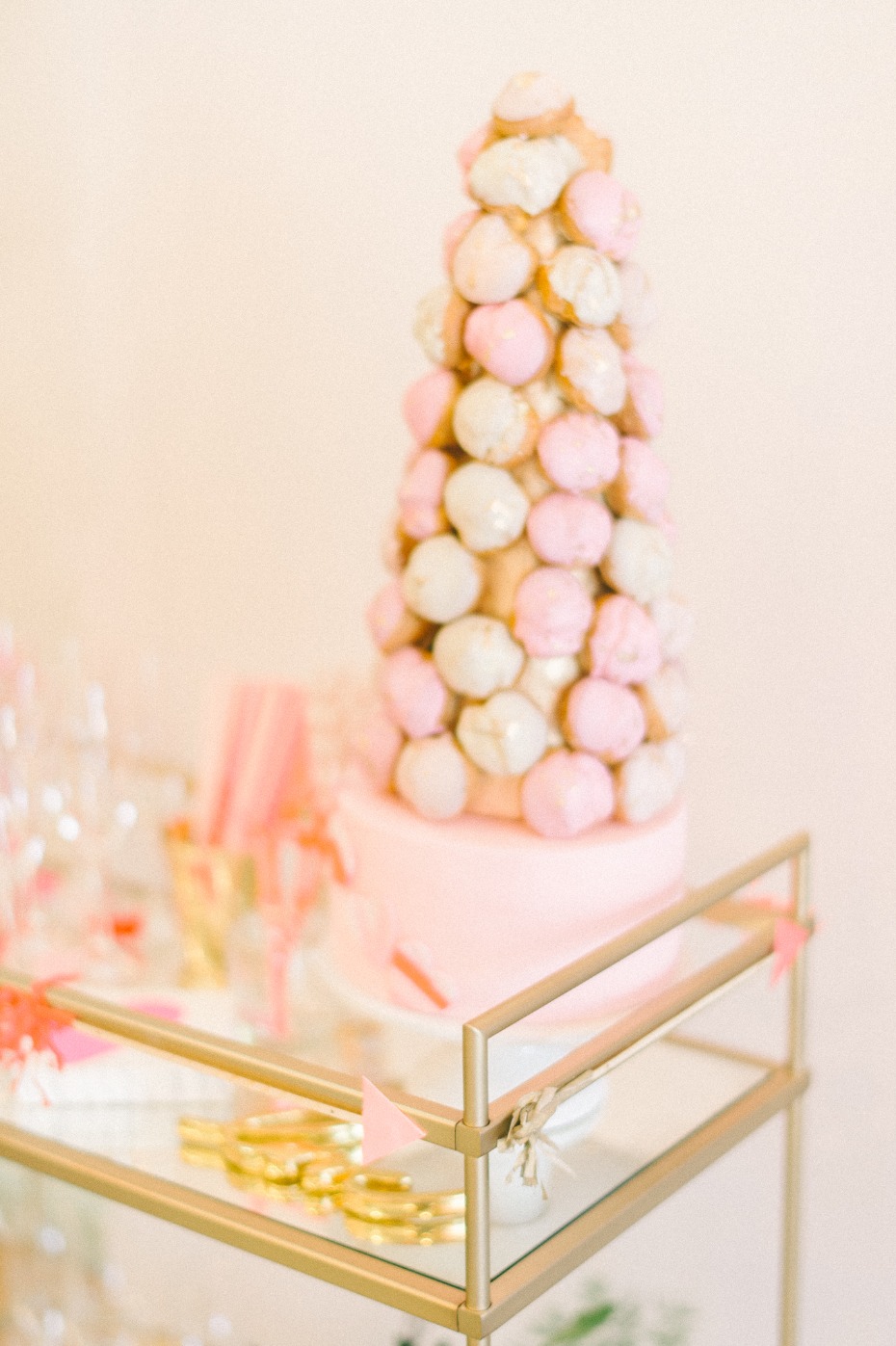 white and pink croquembouche cake