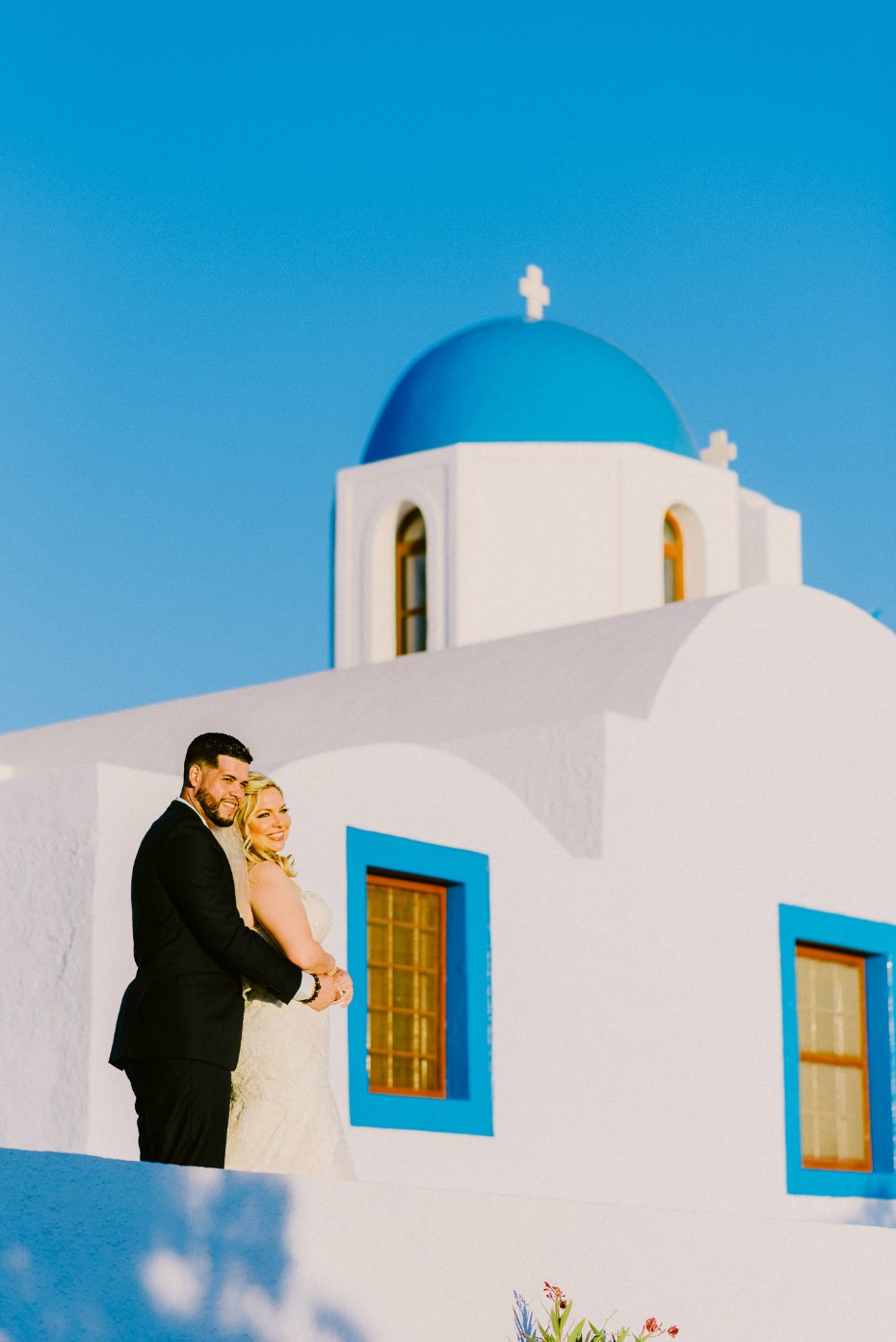 happy wedding couple in Santorini Greece