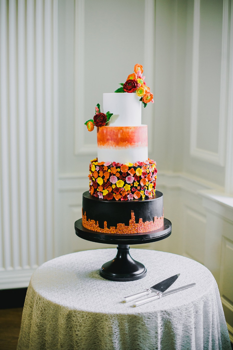 Bold & modern orange and black wedding cake