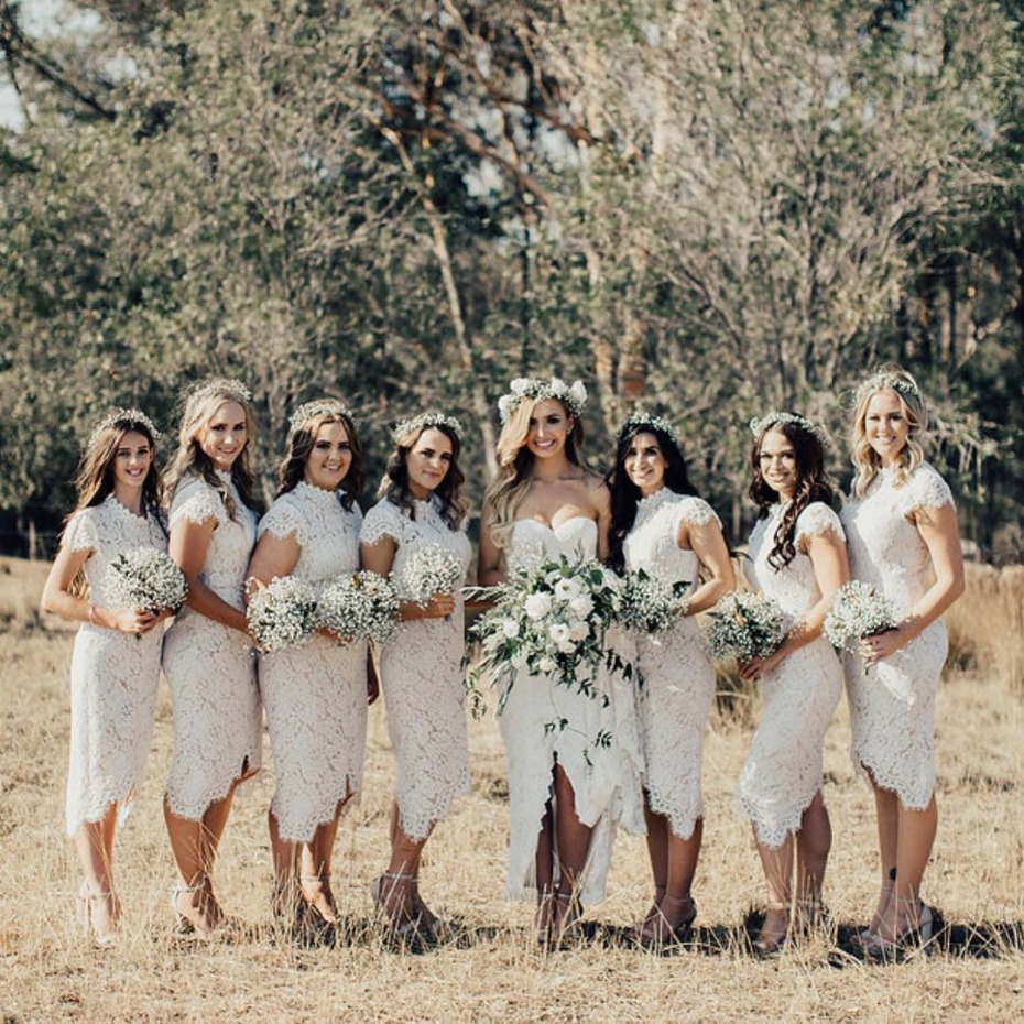 Bridesmaids in white cap sleeve dresses