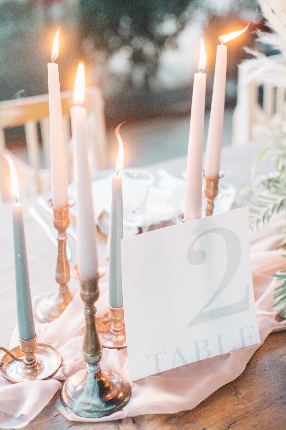 Tapered candles and modern table number