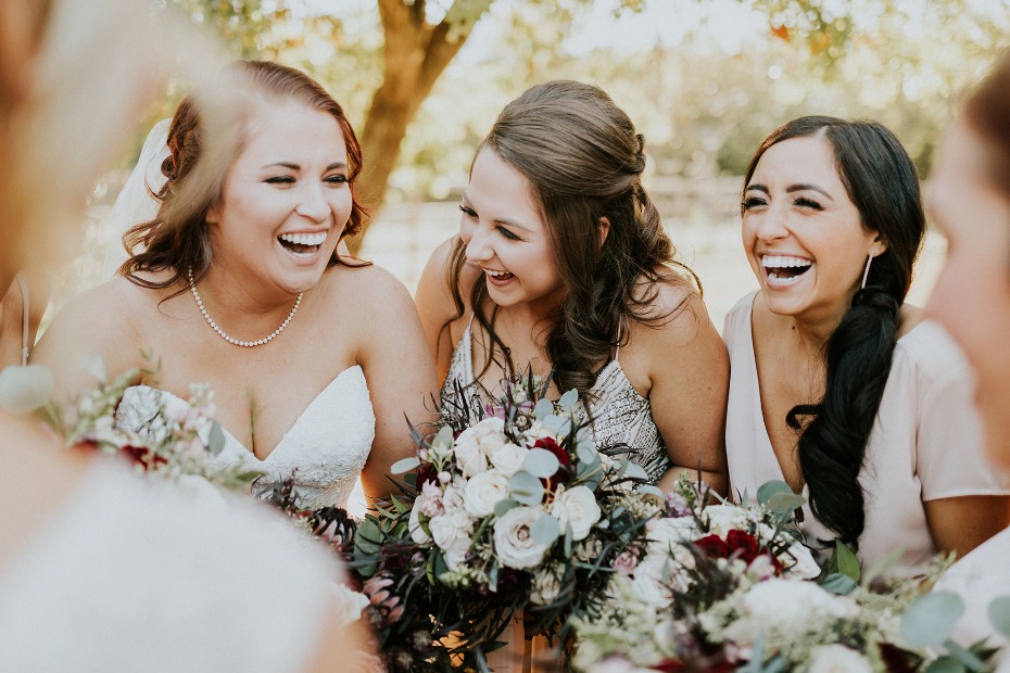 sweet bride and her bridesmaids candid photo