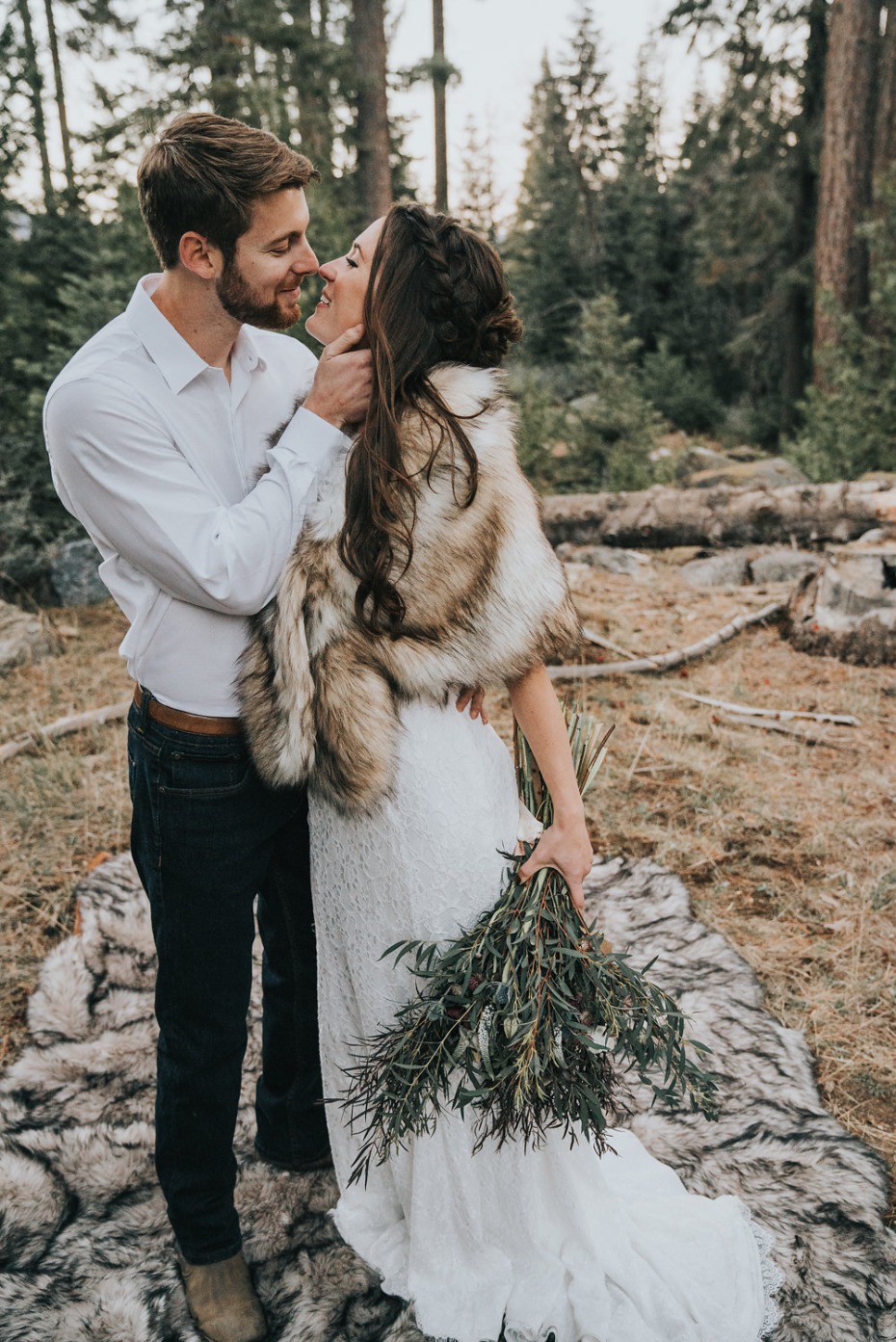 bride and groom in mountain chic wedding attire