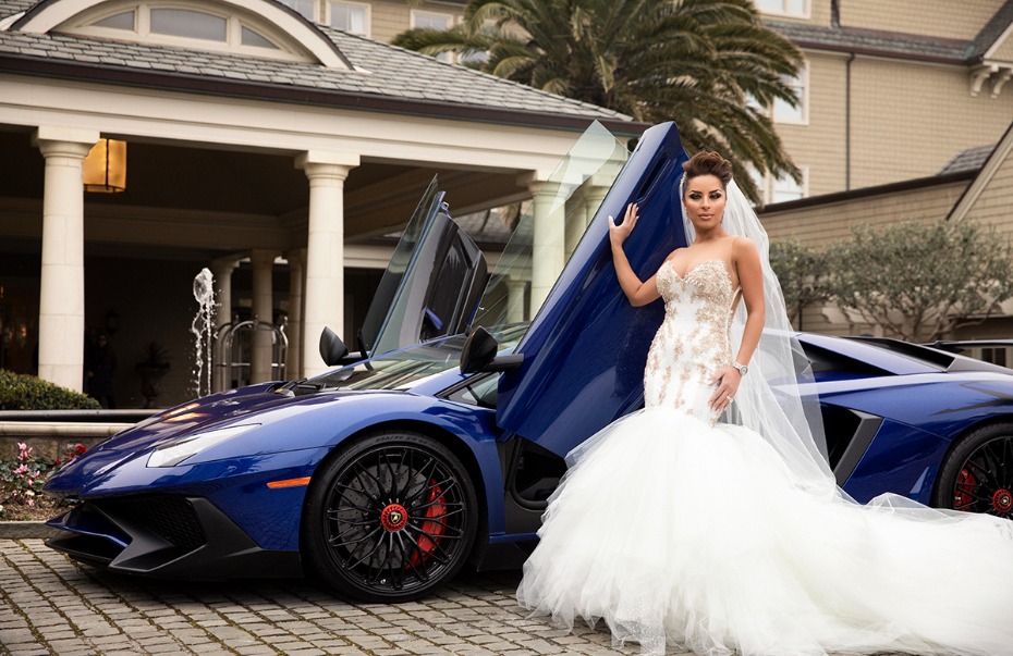 Bride poses with Lamborghini on wedding day for stylish photo