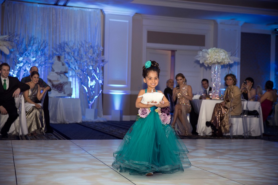 sweet little flower girl in deep teal and floral dress