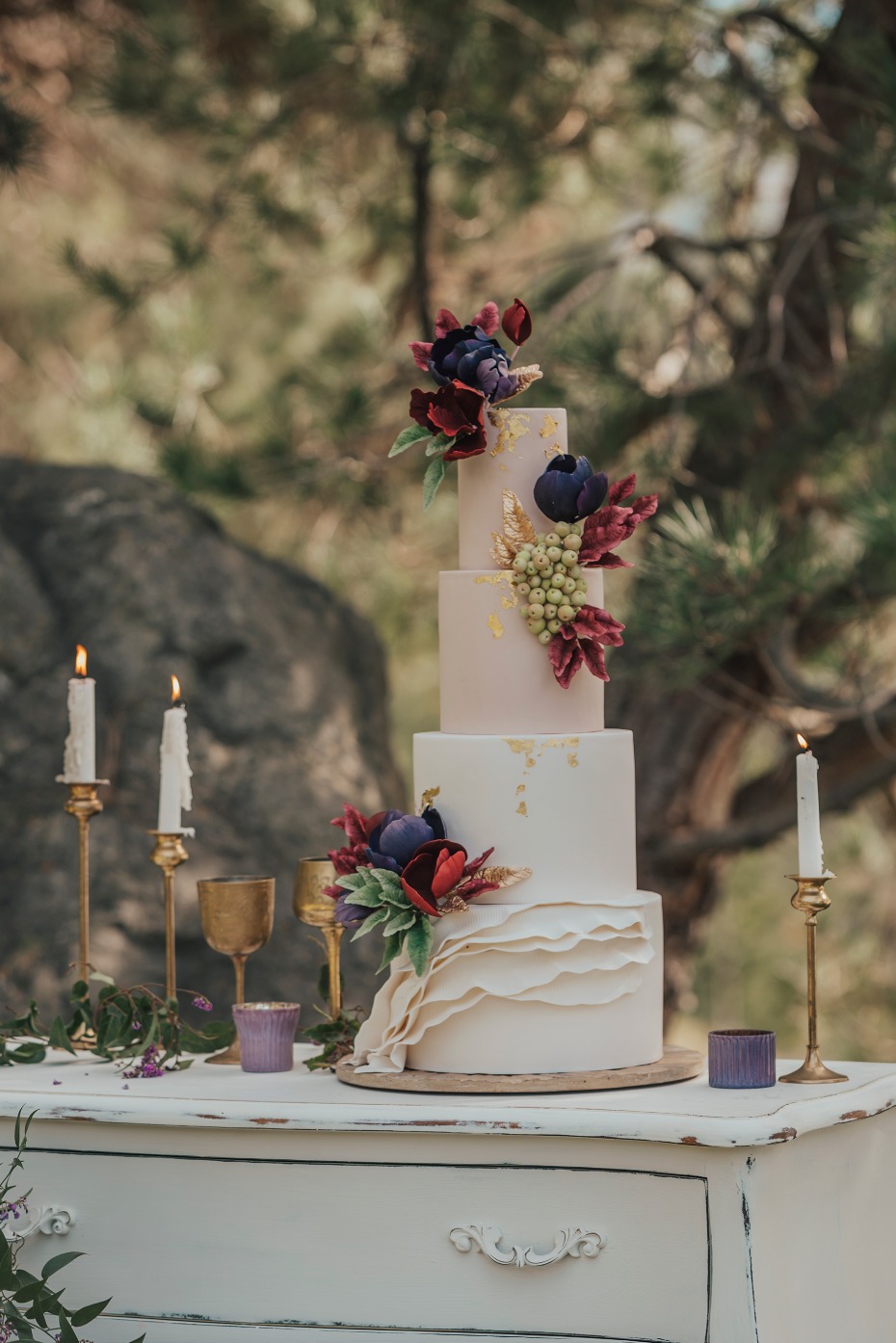 Gold foil wedding cake with edible flowers