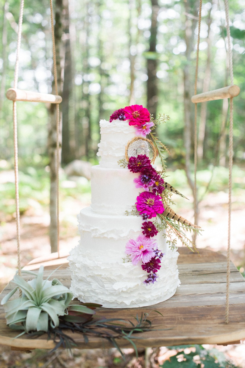 Ruffle cake with flowers, feathers and a dream catcher