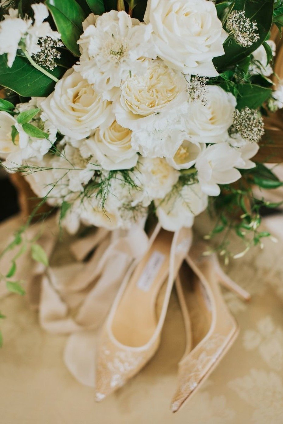 wedding shoes and all white wedding bouquet