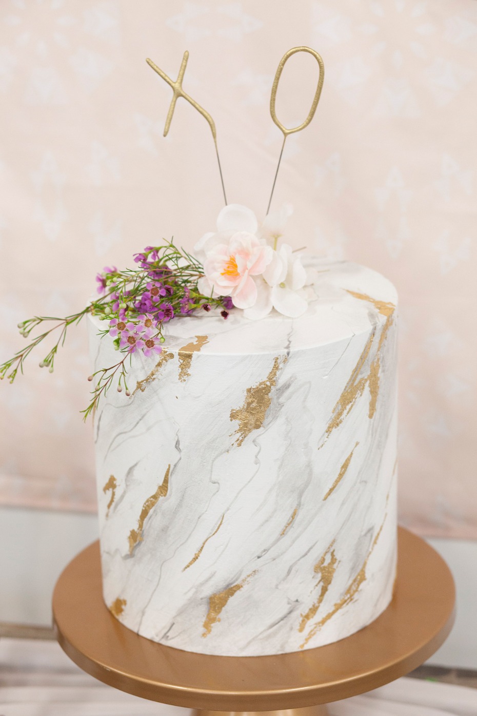 marbled and gold leaf wedding cake