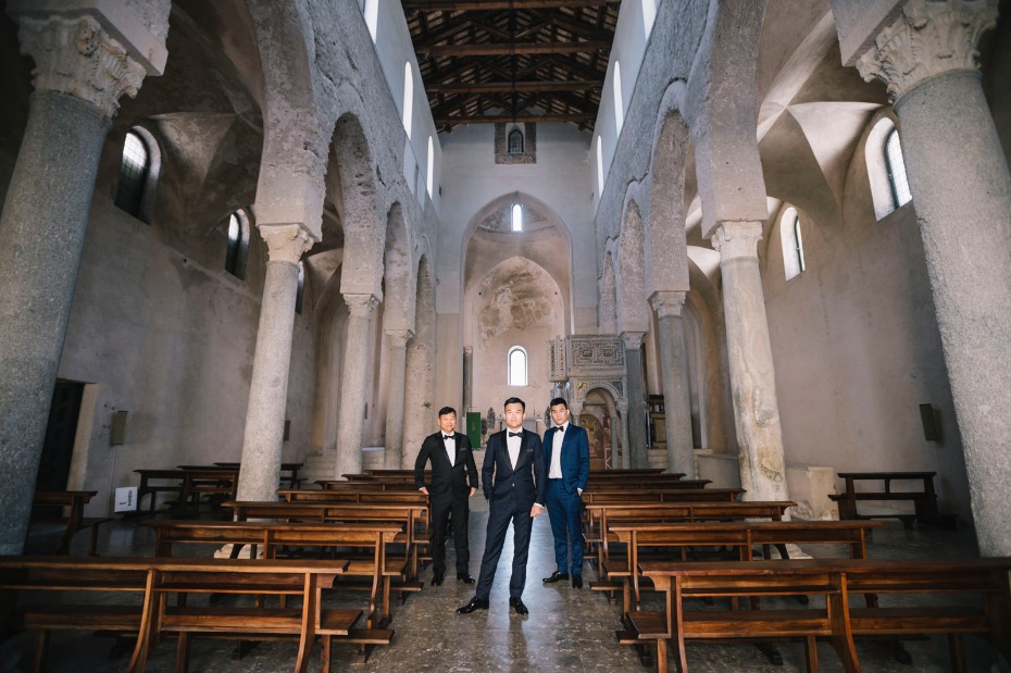 groom and his men in an old chapel