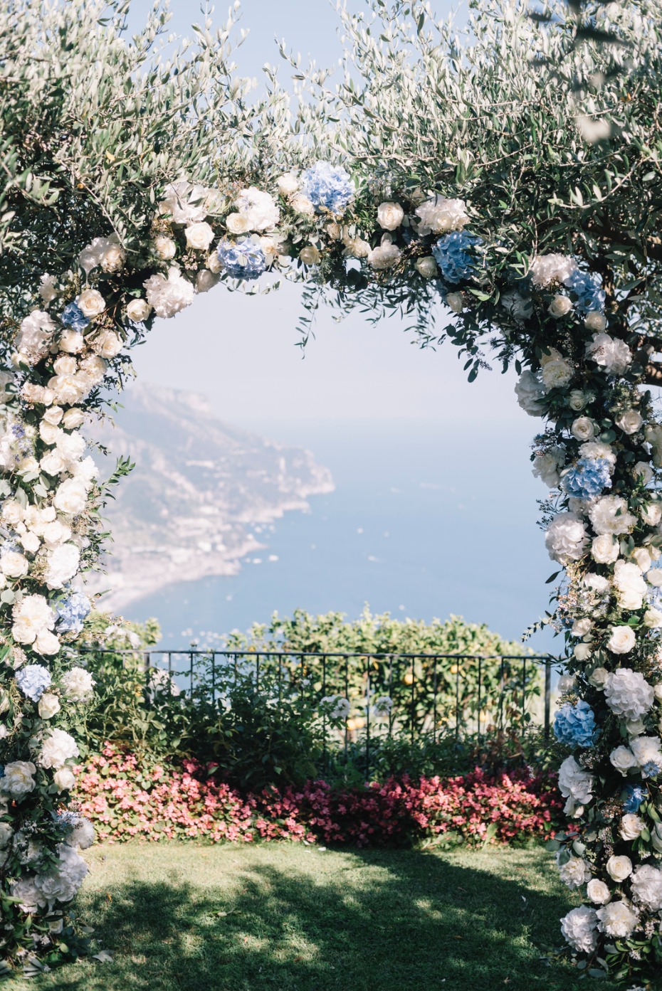 blue and white floral wedding arch