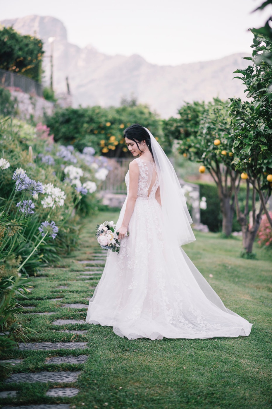Bride in a garden in Italy