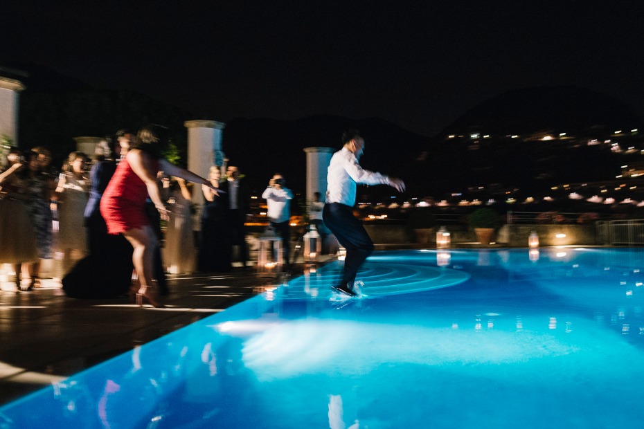 groom dives into the pool