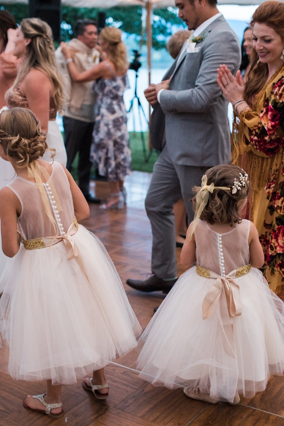 flower girls in tulle skirts and wedding halos