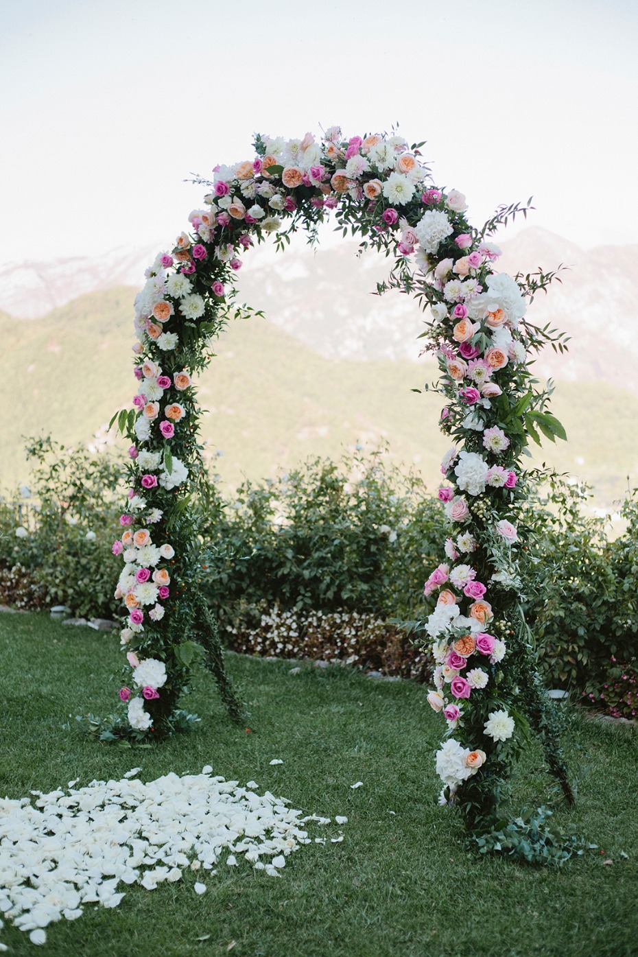 pink and white floral arch