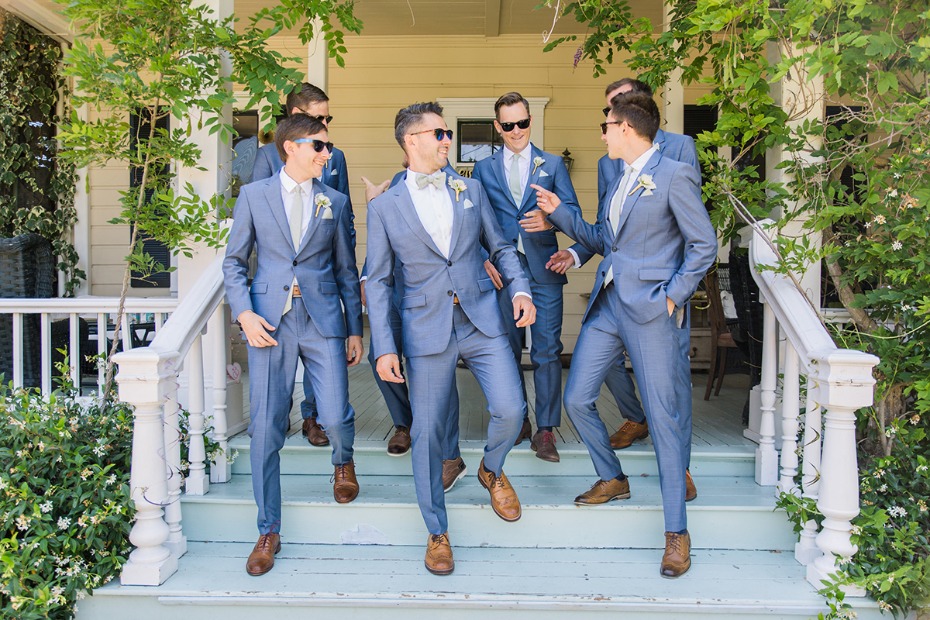 groom and his men in matching blue suits
