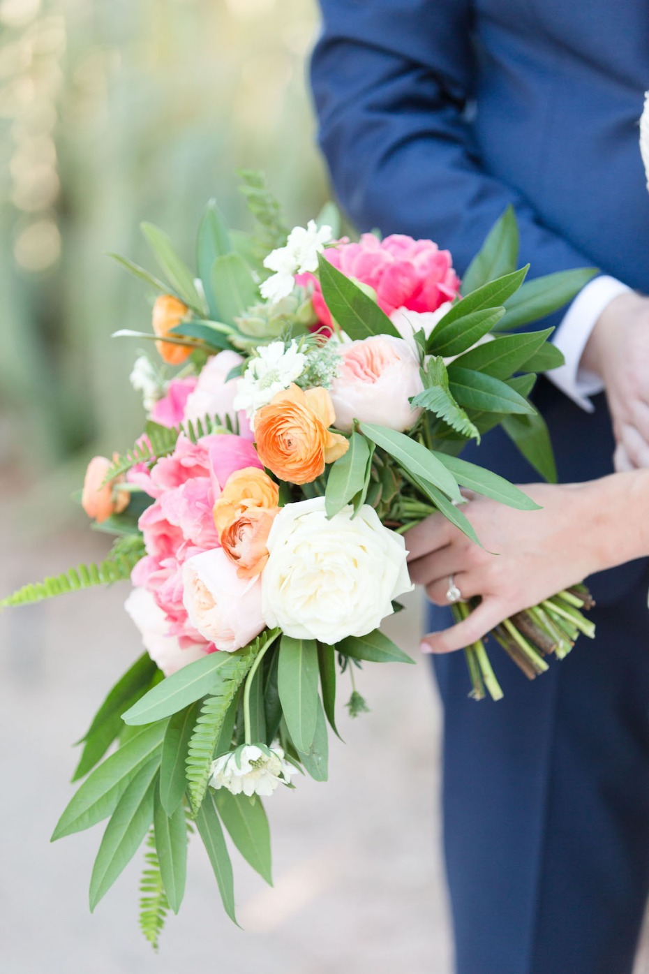 orange and pink wedding bouquet perfect for your summer wedding