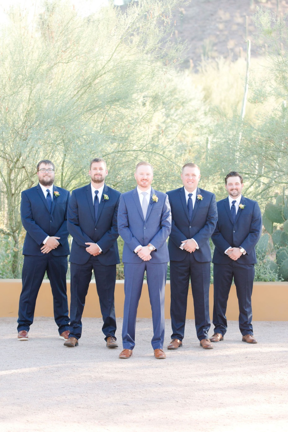 groom and his groomsmen in navy and royal blue