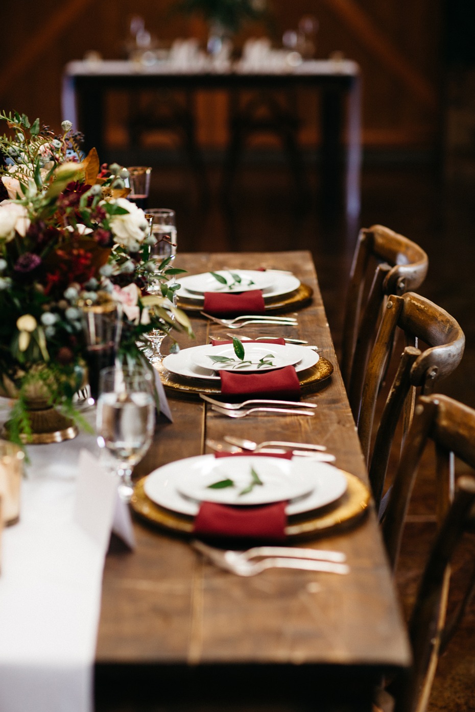 rustic chic late fall wedding table decor with gold and burgundy accents