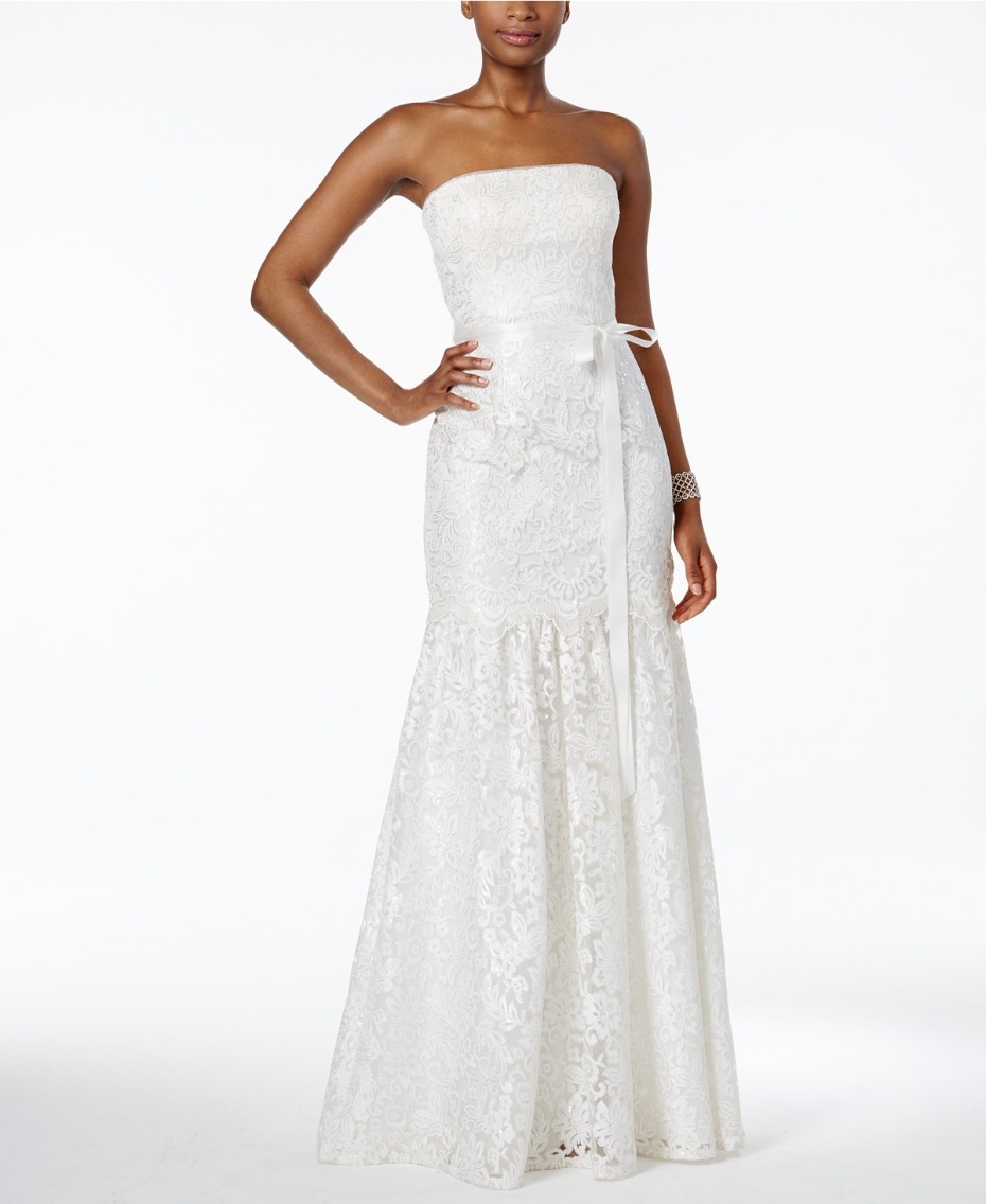 Elegant strapless white lace mermaid gown, perfect for a special occasion