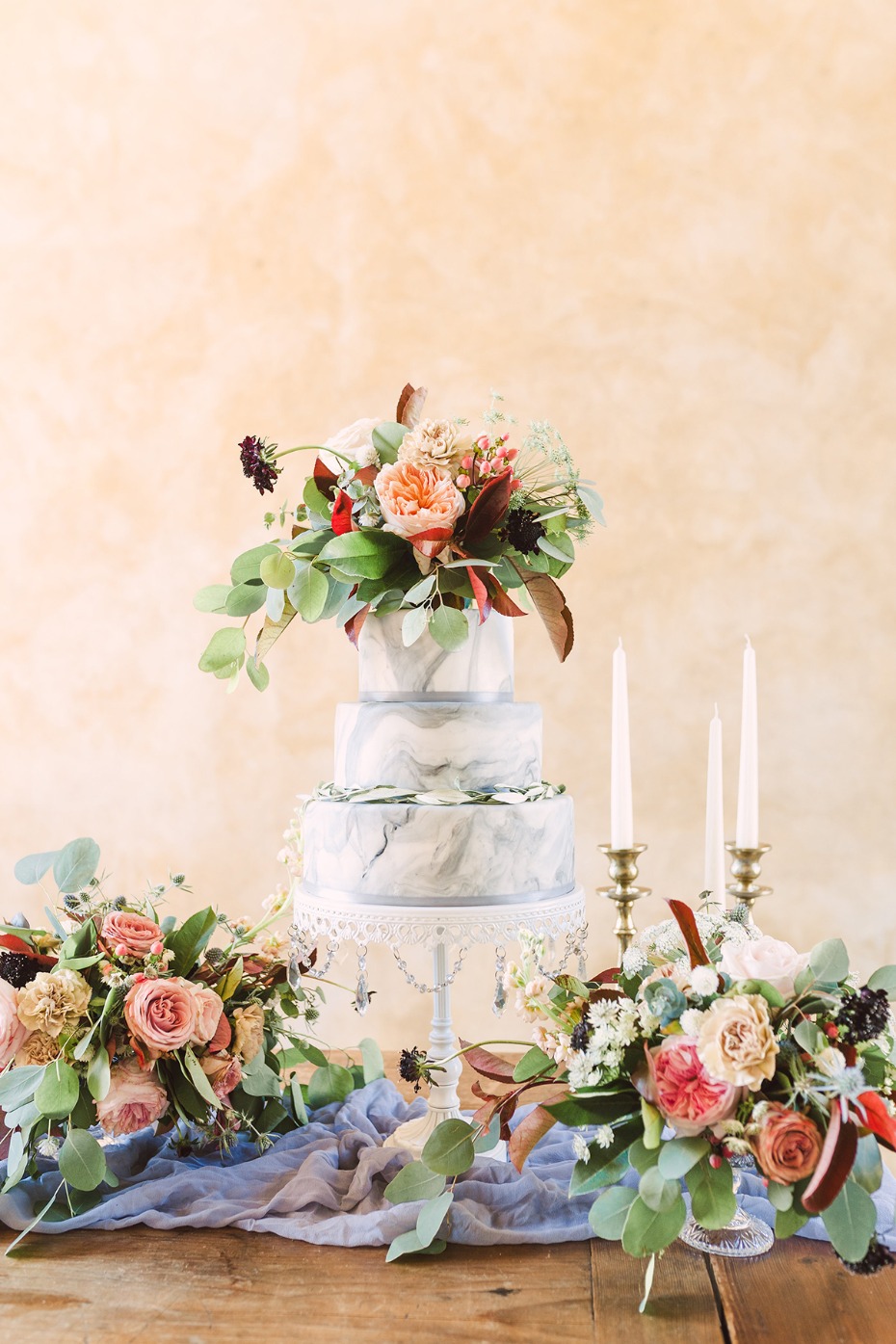 flower topped marbled wedding cake